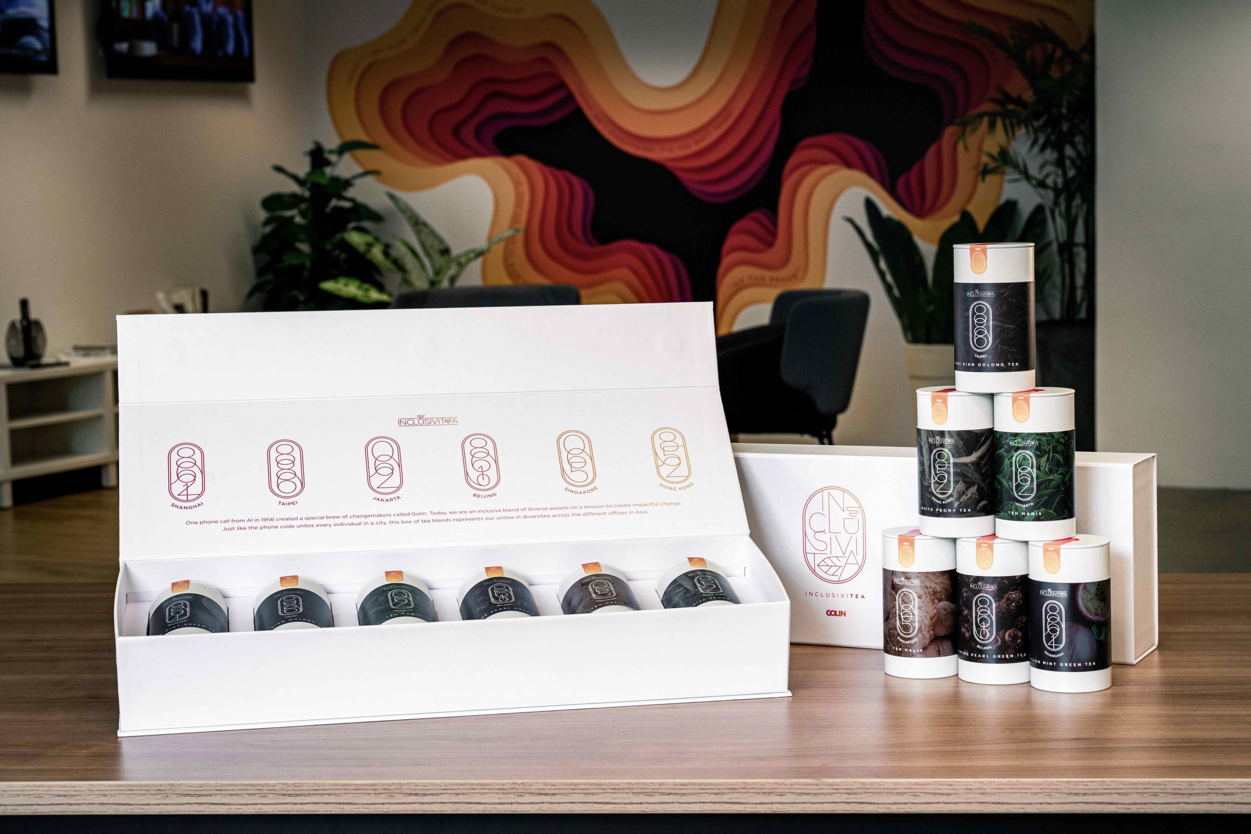 an open box on a table that includes 6 different loose-leaf teas