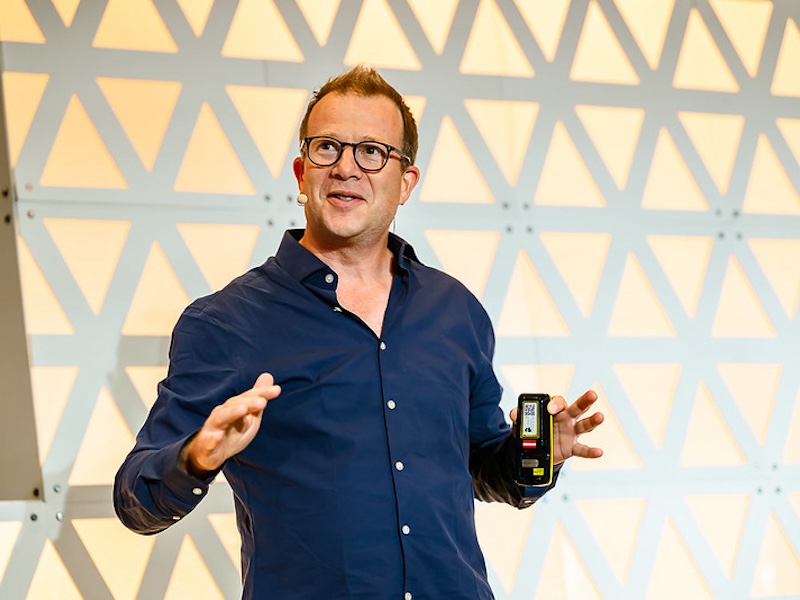 Photo of Jonny Bentwood speaking at AMEC Summit