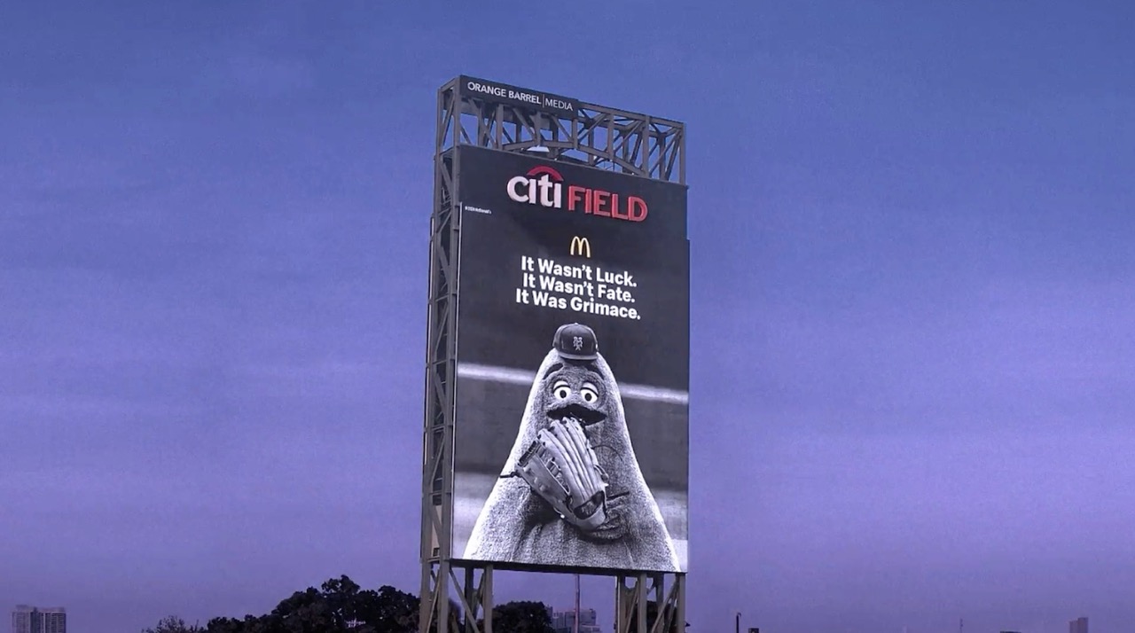 billboard of Grimace at Citi Field