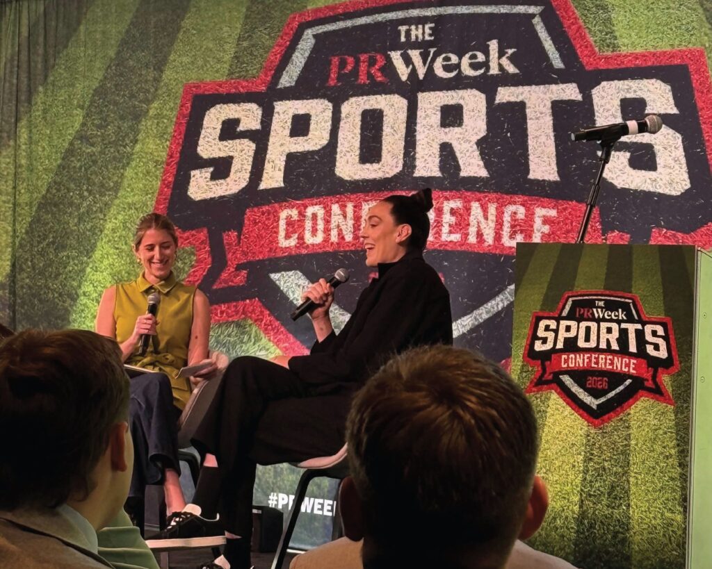 Two women talking at PRWeek Sports Conference